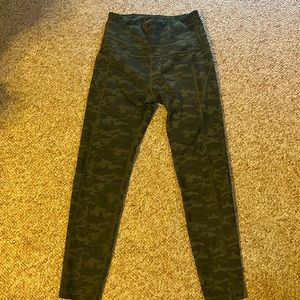 Gently used size medium camouflage women’s leggings.